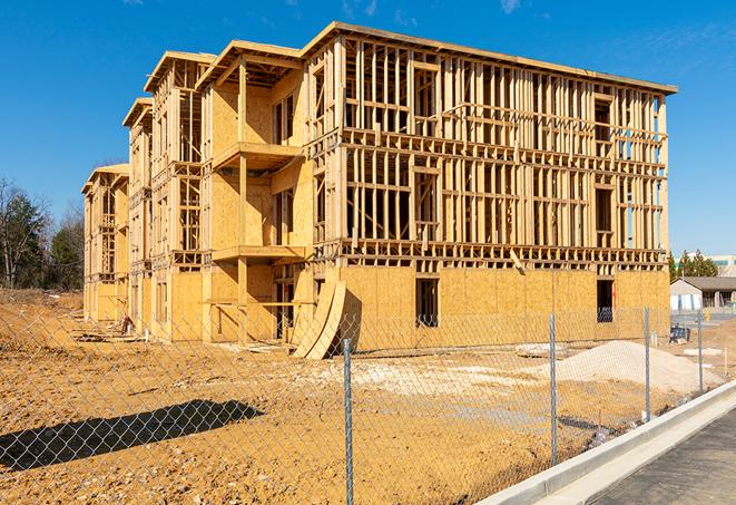 a temporary chain link fence surrounding a construction site, requiring strict safety precautions in Guadalupe CA